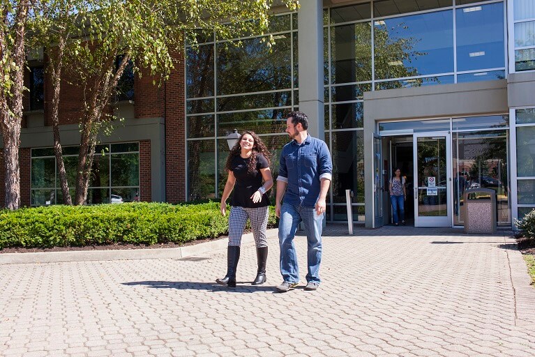 students walking out of HCTC building