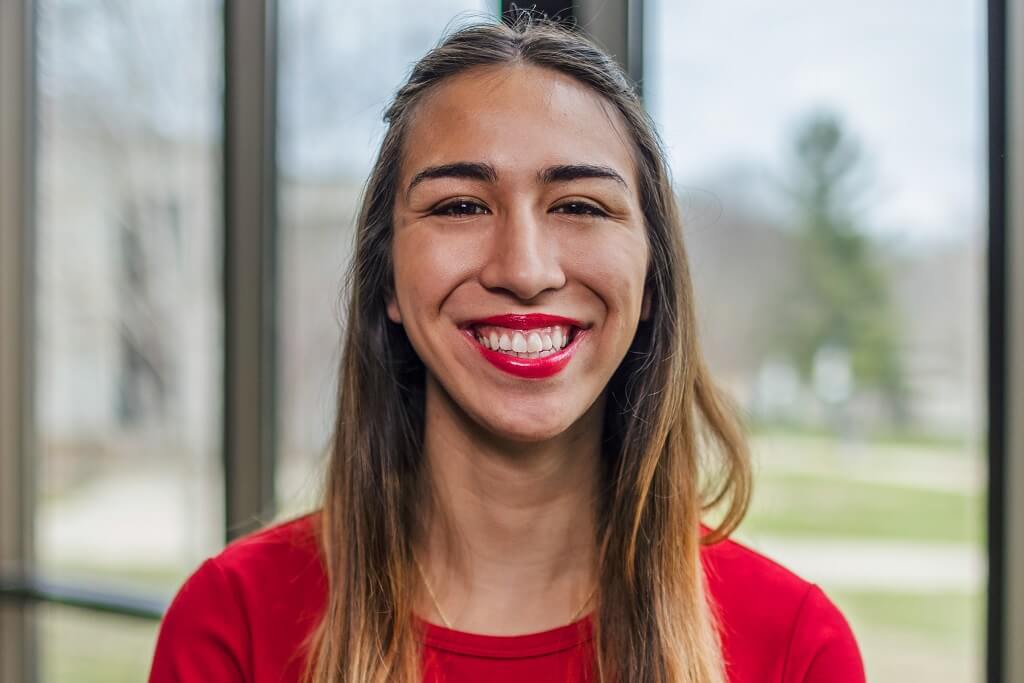 girl smiling looking at camera